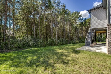 Seller's job transfer brings this barely lived in -one year old on Tellico Village Golf Club in Tennessee - for sale on GolfHomes.com, golf home, golf lot