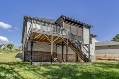 Seller's job transfer brings this barely lived in -one year old on Tellico Village Golf Club in Tennessee - for sale on GolfHomes.com, golf home, golf lot