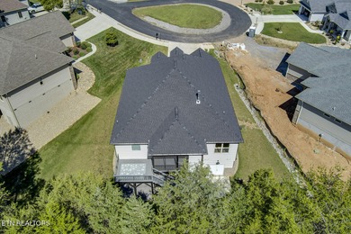 Seller's job transfer brings this barely lived in -one year old on Tellico Village Golf Club in Tennessee - for sale on GolfHomes.com, golf home, golf lot