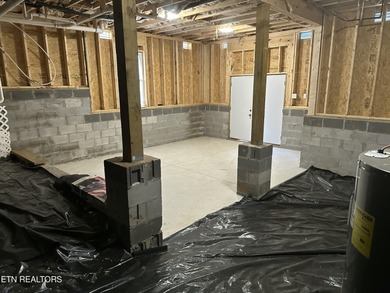 Seller's job transfer brings this barely lived in -one year old on Tellico Village Golf Club in Tennessee - for sale on GolfHomes.com, golf home, golf lot