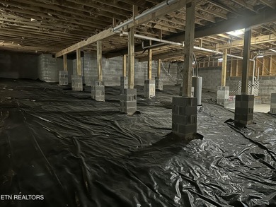 Seller's job transfer brings this barely lived in -one year old on Tellico Village Golf Club in Tennessee - for sale on GolfHomes.com, golf home, golf lot