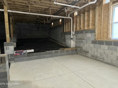 Seller's job transfer brings this barely lived in -one year old on Tellico Village Golf Club in Tennessee - for sale on GolfHomes.com, golf home, golf lot