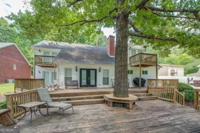 Lakefront Home on Large Level Lot with Covered Dock on Turtle Cove Golf Course in Georgia - for sale on GolfHomes.com, golf home, golf lot