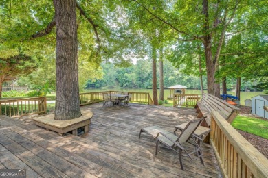 Lakefront Home on Large Level Lot with Covered Dock on Turtle Cove Golf Course in Georgia - for sale on GolfHomes.com, golf home, golf lot