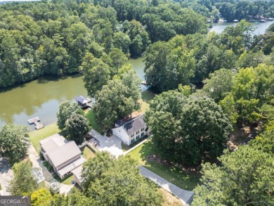 Lakefront Home on Large Level Lot with Covered Dock on Turtle Cove Golf Course in Georgia - for sale on GolfHomes.com, golf home, golf lot