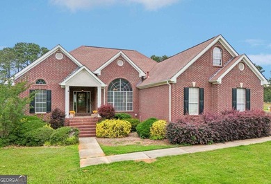 Welcome home to this beautiful all-brick ranch in the on Canongate At Georgia National Golf Club in Georgia - for sale on GolfHomes.com, golf home, golf lot