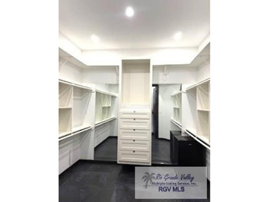 Luxury living in paradise! Located on prestigious Laguna Madre on South Padre Island Golf Club in Texas - for sale on GolfHomes.com, golf home, golf lot