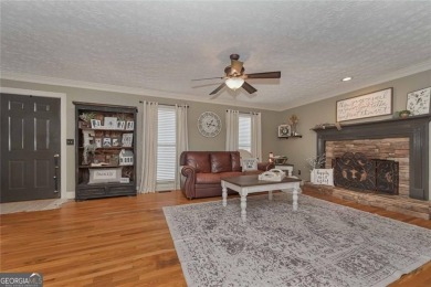 Welcome to 9001 E Carroll Road, a beautifully appointed 4BR/3 on St. Andrews Golf and Country Club in Georgia - for sale on GolfHomes.com, golf home, golf lot