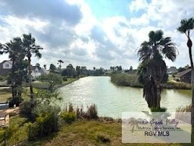 Luxury living in paradise! Located on prestigious Laguna Madre on South Padre Island Golf Club in Texas - for sale on GolfHomes.com, golf home, golf lot