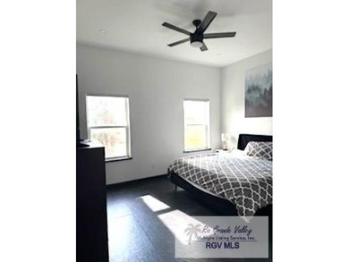 Luxury living in paradise! Located on prestigious Laguna Madre on South Padre Island Golf Club in Texas - for sale on GolfHomes.com, golf home, golf lot