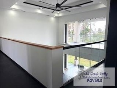 Luxury living in paradise! Located on prestigious Laguna Madre on South Padre Island Golf Club in Texas - for sale on GolfHomes.com, golf home, golf lot