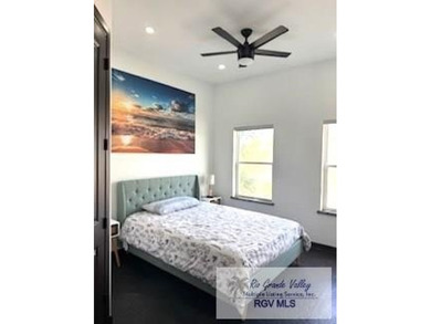 Luxury living in paradise! Located on prestigious Laguna Madre on South Padre Island Golf Club in Texas - for sale on GolfHomes.com, golf home, golf lot