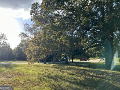 Unique opportunity with abundant possibilities! Attractive on Uncle Remus Golf Course in Georgia - for sale on GolfHomes.com, golf home, golf lot