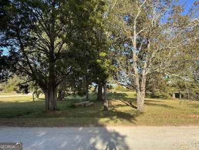Unique opportunity with abundant possibilities! Attractive on Uncle Remus Golf Course in Georgia - for sale on GolfHomes.com, golf home, golf lot