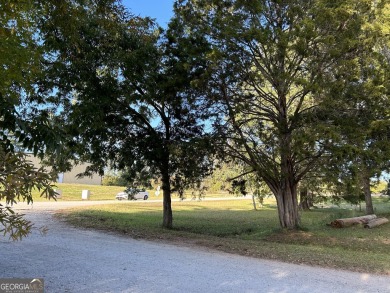 Unique opportunity with abundant possibilities! Attractive on Uncle Remus Golf Course in Georgia - for sale on GolfHomes.com, golf home, golf lot
