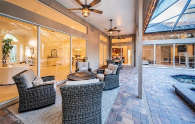 Under contract-accepting backup offers. A stunning ensemble of on Tarpon Woods Golf Club in Florida - for sale on GolfHomes.com, golf home, golf lot