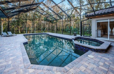 Under contract-accepting backup offers. A stunning ensemble of on Tarpon Woods Golf Club in Florida - for sale on GolfHomes.com, golf home, golf lot