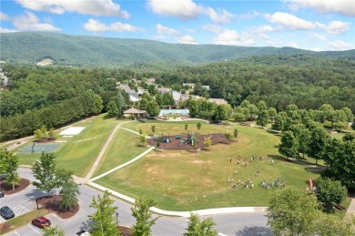 Experience refined lakeside living surrounded by the vibrant on The Highlands Course at Lake Arrowhead in Georgia - for sale on GolfHomes.com, golf home, golf lot