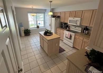 Welcome to your dream home in one of Northville's most coveted on Bushwood Golf Club in Michigan - for sale on GolfHomes.com, golf home, golf lot