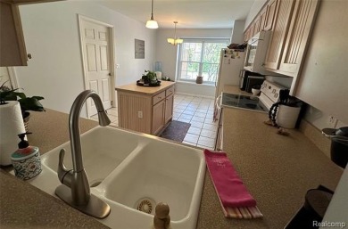 Welcome to your dream home in one of Northville's most coveted on Bushwood Golf Club in Michigan - for sale on GolfHomes.com, golf home, golf lot