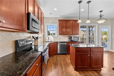 This incredible 2-story brick home has everything you need, at on Baywood Golf Club in North Carolina - for sale on GolfHomes.com, golf home, golf lot