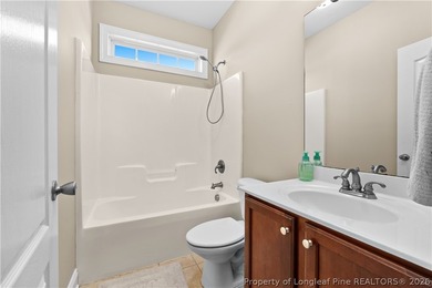 This incredible 2-story brick home has everything you need, at on Baywood Golf Club in North Carolina - for sale on GolfHomes.com, golf home, golf lot