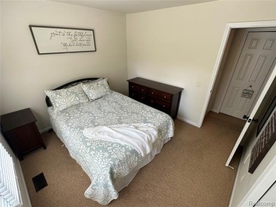 Welcome to your dream home in one of Northville's most coveted on Bushwood Golf Club in Michigan - for sale on GolfHomes.com, golf home, golf lot