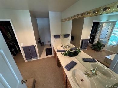 Welcome to your dream home in one of Northville's most coveted on Bushwood Golf Club in Michigan - for sale on GolfHomes.com, golf home, golf lot
