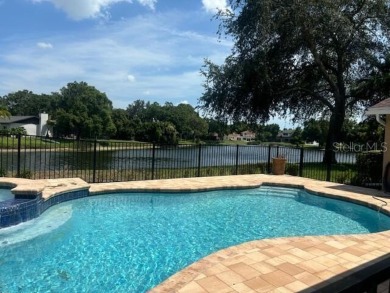 Gorgeous SEMINOLE LAKE COUNTRY CLUB ESTATES pool home on a on Seminole Lake Country Club in Florida - for sale on GolfHomes.com, golf home, golf lot