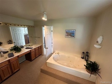 Welcome to your dream home in one of Northville's most coveted on Bushwood Golf Club in Michigan - for sale on GolfHomes.com, golf home, golf lot