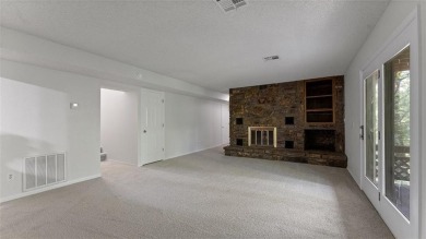 Two fireplaces, two living areas, and tons of bonus space--this on Bella Vista Country Club - Scottsdale in Arkansas - for sale on GolfHomes.com, golf home, golf lot