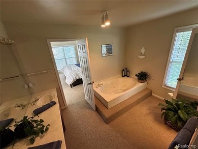 Welcome to your dream home in one of Northville's most coveted on Bushwood Golf Club in Michigan - for sale on GolfHomes.com, golf home, golf lot