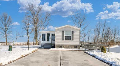 Charming and well-maintained 2006 mobile home offers the perfect on Lake of the Woods Golf Course in Illinois - for sale on GolfHomes.com, golf home, golf lot