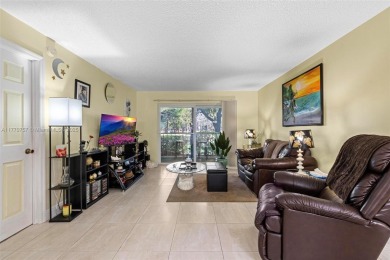 Enjoy the scenic garden view in this beautifully updated on Inverrary Country Club in Florida - for sale on GolfHomes.com, golf home, golf lot