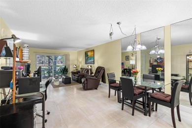 Enjoy the scenic garden view in this beautifully updated on Inverrary Country Club in Florida - for sale on GolfHomes.com, golf home, golf lot