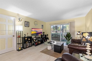 Enjoy the scenic garden view in this beautifully updated on Inverrary Country Club in Florida - for sale on GolfHomes.com, golf home, golf lot