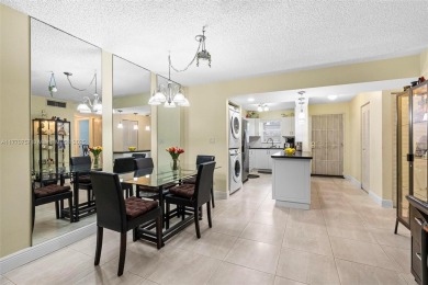 Enjoy the scenic garden view in this beautifully updated on Inverrary Country Club in Florida - for sale on GolfHomes.com, golf home, golf lot