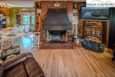 Cute Year Round Mountain Cabin.  Open floor plan with fantastic on Land Harbor Golf Course in North Carolina - for sale on GolfHomes.com, golf home, golf lot