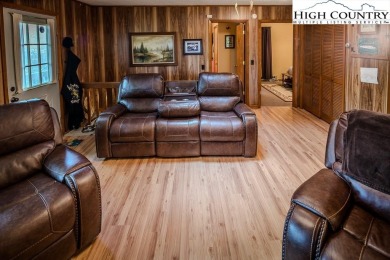 Cute Year Round Mountain Cabin.  Open floor plan with fantastic on Land Harbor Golf Course in North Carolina - for sale on GolfHomes.com, golf home, golf lot
