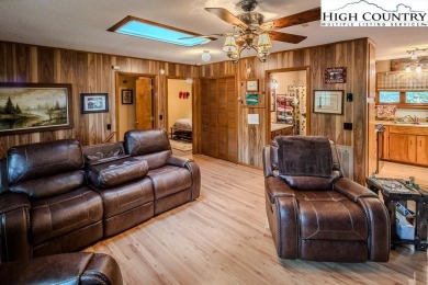 Cute Year Round Mountain Cabin.  Open floor plan with fantastic on Land Harbor Golf Course in North Carolina - for sale on GolfHomes.com, golf home, golf lot