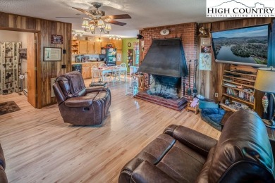 Cute Year Round Mountain Cabin.  Open floor plan with fantastic on Land Harbor Golf Course in North Carolina - for sale on GolfHomes.com, golf home, golf lot