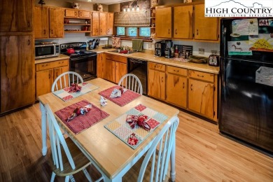 Cute Year Round Mountain Cabin.  Open floor plan with fantastic on Land Harbor Golf Course in North Carolina - for sale on GolfHomes.com, golf home, golf lot