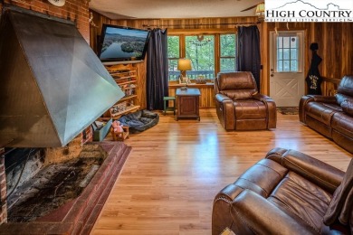 Cute Year Round Mountain Cabin.  Open floor plan with fantastic on Land Harbor Golf Course in North Carolina - for sale on GolfHomes.com, golf home, golf lot