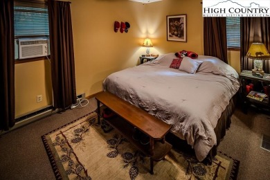 Cute Year Round Mountain Cabin.  Open floor plan with fantastic on Land Harbor Golf Course in North Carolina - for sale on GolfHomes.com, golf home, golf lot