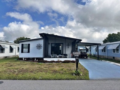 Welcome to your perfect retreat! This cozy 2 bedroom, 1 bathroom on Lake Henry Golf Club in Florida - for sale on GolfHomes.com, golf home, golf lot