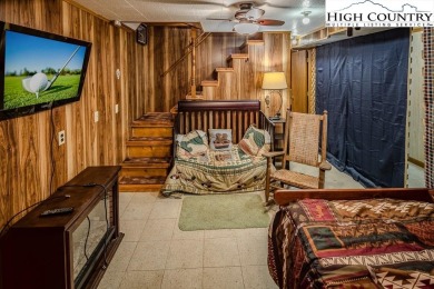 Cute Year Round Mountain Cabin.  Open floor plan with fantastic on Land Harbor Golf Course in North Carolina - for sale on GolfHomes.com, golf home, golf lot
