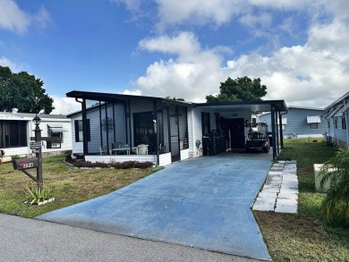 Welcome to your perfect retreat! This cozy 2 bedroom, 1 bathroom on Lake Henry Golf Club in Florida - for sale on GolfHomes.com, golf home, golf lot