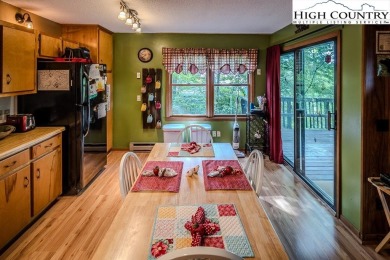 Cute Year Round Mountain Cabin.  Open floor plan with fantastic on Land Harbor Golf Course in North Carolina - for sale on GolfHomes.com, golf home, golf lot