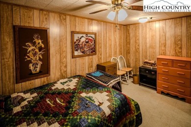Cute Year Round Mountain Cabin.  Open floor plan with fantastic on Land Harbor Golf Course in North Carolina - for sale on GolfHomes.com, golf home, golf lot