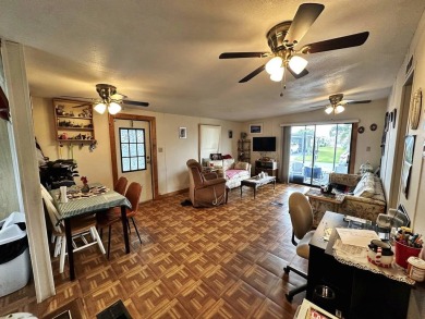 Welcome to your perfect retreat! This cozy 2 bedroom, 1 bathroom on Lake Henry Golf Club in Florida - for sale on GolfHomes.com, golf home, golf lot
